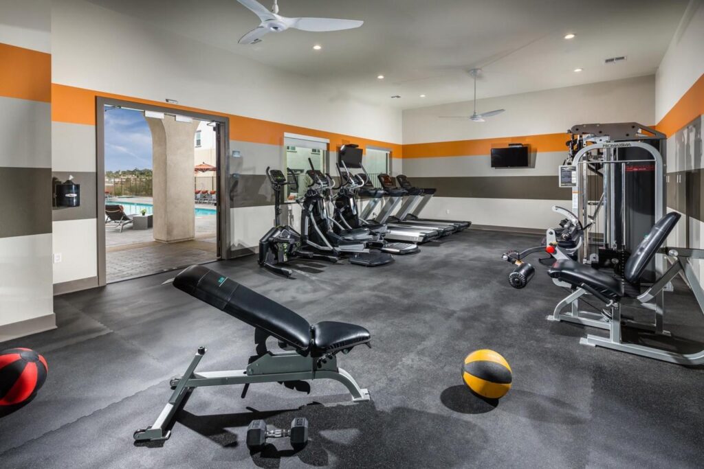 A view of pool from inside the fitness center